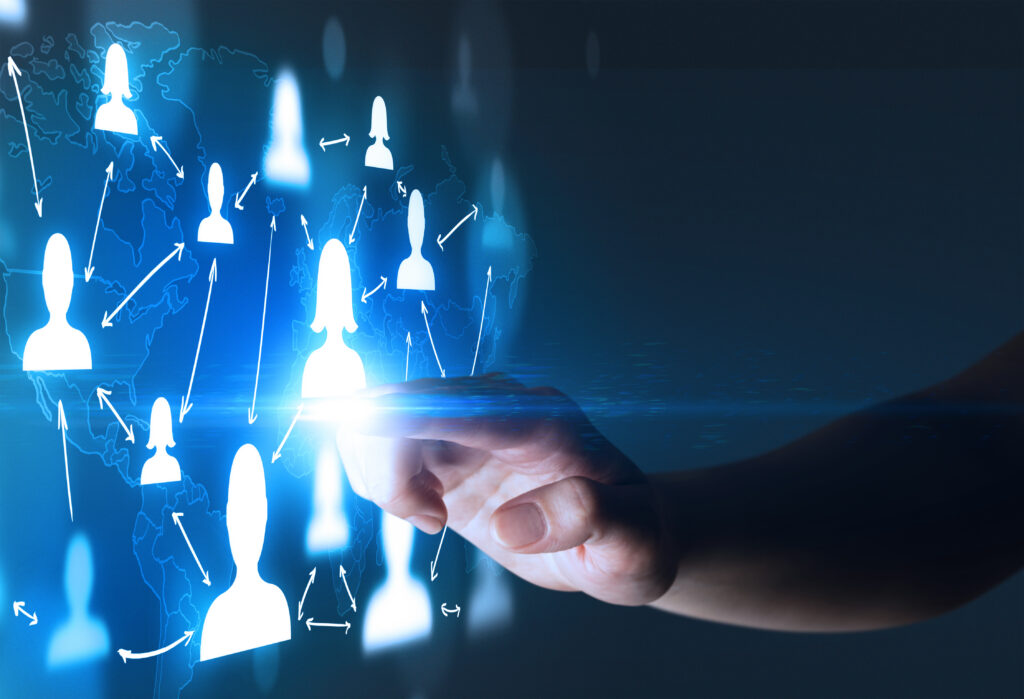 A person’s finger touching a beam of light signifying lead generation